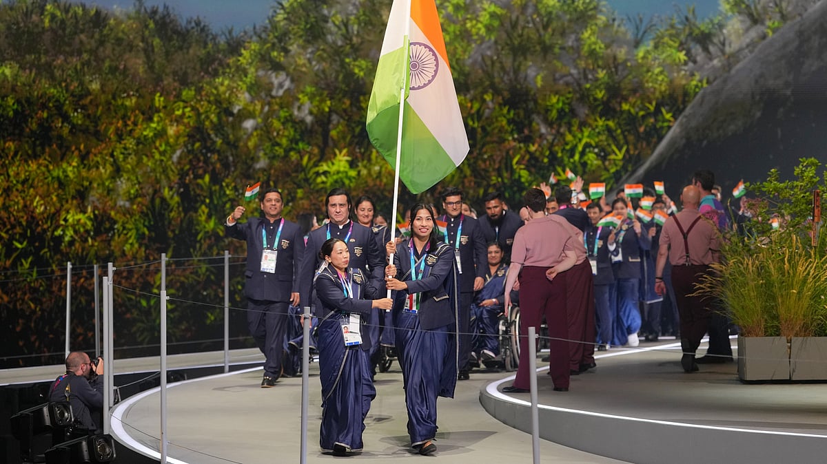 The team from India arrives on stage during the Commonwealth Games opening ceremony in Glasgow, Scotland, Thursday, July 23, 2026 - (AP Photo/Kin Cheung)