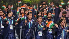 The team from India arrives onstage during the Commonwealth Games opening ceremony in Glasgow, Scotland, Thursday, July 23, 2026 - (AP Photo/Kin Cheung)