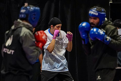 Indian boxer Parveen Hooda, centre, during a training session ahead of the Glasgow Commonwealth Games 2026, at the SEC Centre in Glasgow, Scotland.