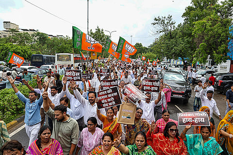 BJP workers take out a protest march towards Rajasthan Congress office against the sit-in protest by LoP in Lok Sabha Rahul Gandhi and Congress MP Priyanka Gandhi near the residence of PM in Delhi on Tuesday, in Jaipur.