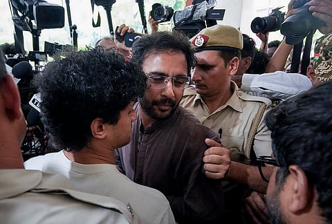 Cockroach Janata Party (CJP) spokespersons Saurav Das and Ashutosh Ranka leave after a meeting with Union Ministers JP Nadda and Jitendra Singh, at the Vithalbhai Patel House, in New Delhi.