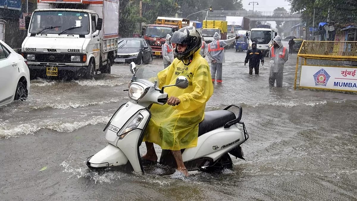 Scenes during rainfall in Delhi - null