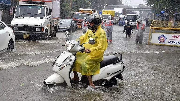 Scenes during rainfall in Delhi - null