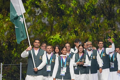 The team from Pakistan arrives on stage during the Commonwealth Games opening ceremony in Glasgow, Scotland.