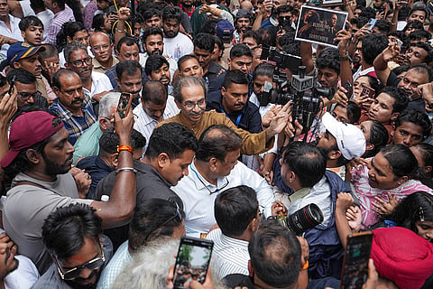 Shiv Sena (UBT) chief Uddhav Thackeray in a protest march as part of the Cockroach Janata Party's (CJP) ongoing protest movement demanding the resignation of Union Education Minister Dharmendra Pradhan over the NEET paper leak issue, at Shivaji Park, in Mumbai.