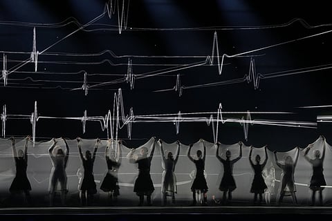 Performers illustrate the Scottish textile industry during the Commonwealth Games opening ceremony in Glasgow, Scotland.