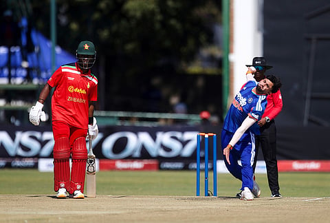 India's bowler Ashok Sharma bowls as Zimbabwe's batsman Dion Myers watches on during the first T20 cricket match between Zimbabwe and India in Harare, Zimbabwe, Thursday, July 23, 2026. 