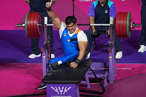 India's Ashok competes in the Men's Lightweight Group A para powerlifting event at the 23rd Commonwealth Games, in Glasgow.