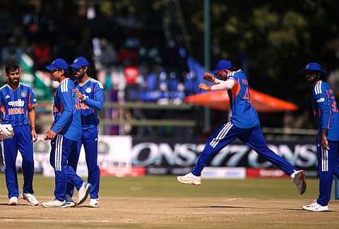 India players celebrate a wicket during the first T20 cricket match between Zimbabwe and India in Harare, Zimbabwe, Thursday, July 23, 2026. 