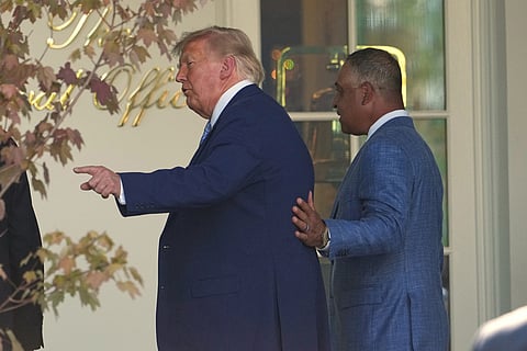 President Donald Trump walks to the Oval Office with manager Dave Roberts after an event to honor the 2025 World Series champions Los Angeles Dodgers in the Rose Garden of the White House, Thursday, July 23, 2026, in Washington. ()