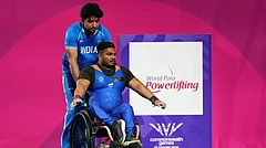 India's Jhandu Kumar arrives to compete in the men's heavy weight para power lifting during the Commonwealth Games in Glasgow, Scotland, Friday, July 24, 2026 - (AP Photo/Eranga Jayawardena)