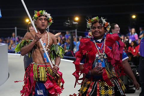 Members of the Tuvalu teams take part in the Commonwealth Games opening ceremony in Glasgow, Scotland.