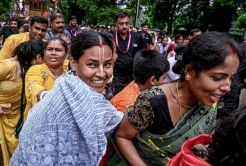 People take part in 'Bahuda Yatra' organised by ISKCON (International Society for Krishna Consciousness), in Kolkata, West Bengal.