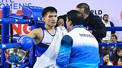 Indian Boxer Jadumani Singh receiving instructions from his corner during a boxing match. - Insta/boxermani_jr