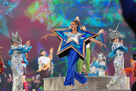 Performers dance as they take part in the Commonwealth Games opening ceremony in Glasgow, Scotland.