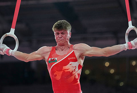 Wales's Elliot Vernon competes on the rings during the men's team final and individual qualification of Artistic Gymnastics at the Commonwealth Games in Glasgow, Scotland, Friday, July 24, 2026. 