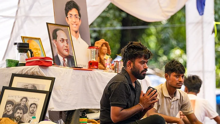 Cockroach Janta Party (CJP) founder Abhijeet Dipke during a protest demanding the resignation of Dharmendra Pradhan - Photo: PTI/Salman Ali