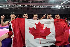 Canada team members celebrate after winning the gold medal in the men's artistic gymnastics team final at the Commonwealth Games in Glasgow, Scotland, Friday, July 24, 2026. - | Photo: AP/Manish Swarup