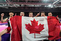 | Photo: AP/Manish Swarup : 
Canada team members celebrate after winning the gold medal in the men's artistic gymnastics team final at the Commonwealth Games in Glasgow, Scotland, Friday, July 24, 2026. 