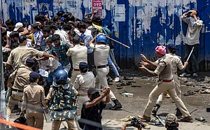 PTI : Security personnel try to evict protesters during the Bihar Bandh called over the alleged NEET paper leak and police action against protesting students, at Ram Gulam Chowk, in Patna, Bihar, Saturday, July 25, 2026.