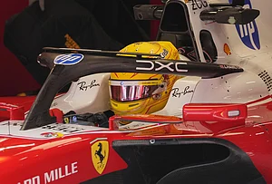 | Photo: AP/Darko Vojinovic : Ferrari driver Lewis Hamilton, of Britain, sits on his car at pit during the second practice session ahead of Sunday's Formula One Hungarian Grand Prix auto race, at the Hungaroring racetrack in Mogyorod, near Budapest, Hungary, Friday, July 24, 2026.