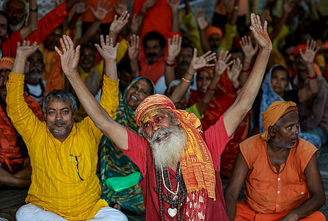 Seers wait to register for the annual Amarnath Yatra at Ram mandir base camp, in Jammu, Jammu and Kashmir.