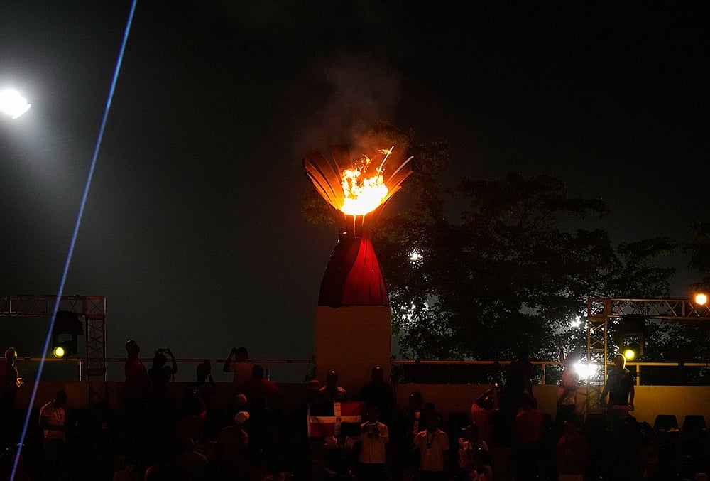 The cauldron is lit during the opening ceremony of the Central American and Caribbean Games in Santo Domingo, Dominican Republic, Friday, July 24, 2026. 

