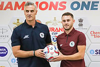 Durand Cup : East Bengal vs Mohun Bagan Live: Panagiotis Dilmperis, Head Coach, Mohun Bagan Super Giant, and Dejan Dražić, player, Mohun Bagan Super Giant, pose with the official match ball of the 135th IndianOil Durand Cup.