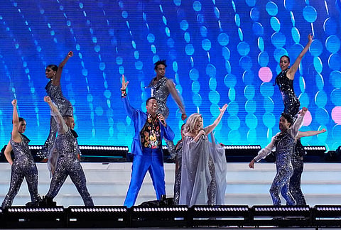 Dominican Republic's singers Jandy Ventura, left, and Miriam Cruz perform during the opening ceremony of the Central American and Caribbean Games in Santo Domingo, Dominican Republic, Friday, July 24, 2026. 
 
