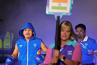 | Photo: PTI/Ravi Choudhary : India's Jadumani Singh Mandengbam makes his way to the ring ahead of his men's 55kg Round of 32 boxing bout at the Commonwealth Games 2026, in Glasgow. Jadumani won the bout by a 5-0 unanimous decision to advance to the Round of 16. 