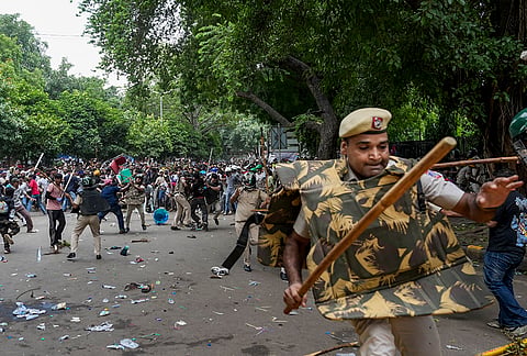 Chaos erupted at the site amid the ongoing protest of Cockroach Janta Party (CJP) demanding the resignation of union education Minister Dharmendra Pradhan over the NEET paper leak issue, at Jantar Mantar, in New Delhi, Saturday, July 25, 2026. 