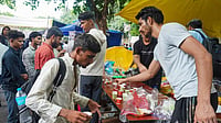 CJP Alleges Delhi Police Blocking Food From Reaching Protest Site As Afternoon Meeting Draws Near | Photo: PTI : Cockroach Janata Party (CJP) supporters received free food being distributed during a protest at the Jantar Mantar