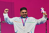 From Poverty To Glasgow Podium: How Polio Survivor Jhandu Kumar Lifted An Entire Nation - See The Best Photos | Photo: AP/Eranga Jayawardena : India's Jhandu Kumar celebrates his bronze medal won in the men's heavy weight para power lifting during the Commonwealth Games in Glasgow, Scotland, Friday, July 24, 2026.