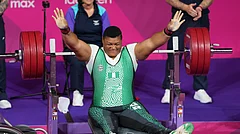 Nigeria's Folashade Oluwafemiayo celebrates after her new record lift in the women's heavy weight para powerlifting during the Commonwealth Games in Glasgow, Scotland, Friday, July 24, 2026. - (AP Photo/Eranga Jayawardena)