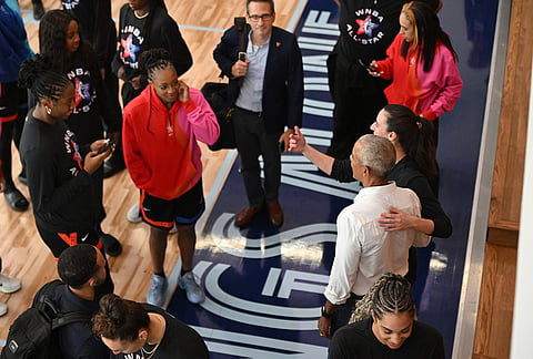Former President Barack Obama poses with WNBA All-Star Caitlin Clark during a practice at the Obama Presidential Center in Chicago, Friday, July 24, 2026. 