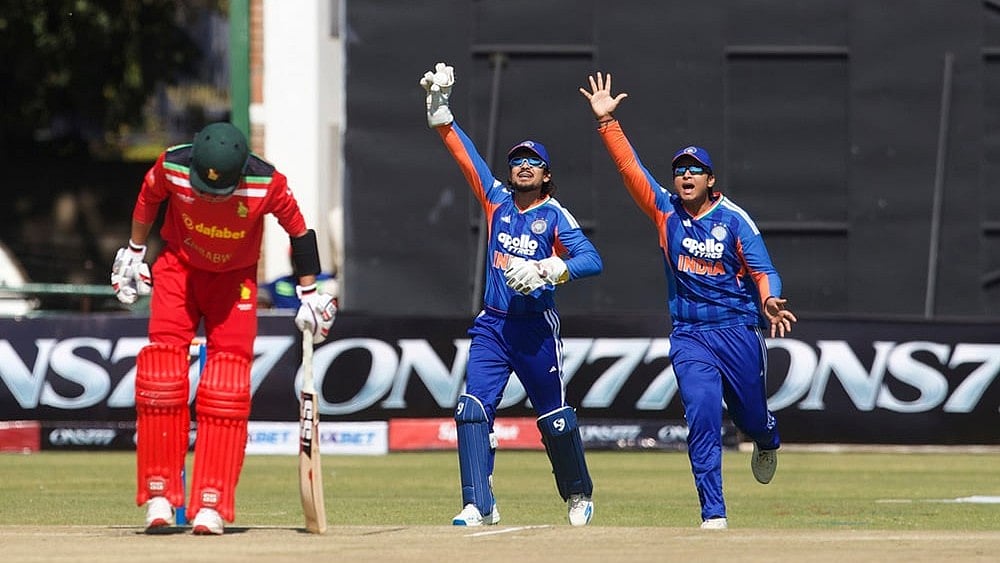 India's wicketkeeper Ishan Kishan, center, and his teammate appeal for wicket of Zimbabwe's batsman Brian Bennett, left, during the first T20 cricket match between Zimbabwe and India in Harare, Zimbabwe, Thursday, July 23, 2026. - | Photo: AP/Wonder Mashura