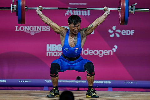 India's Rishikant Chanambam Singh competes in 60 kilogram category of Clean and Jerk in weightlifting during the Commonwealth Games in Glasgow, Scotland.