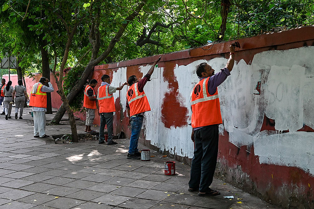 Workers clean Jantar Mantar