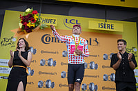 | Photo: AP/Thibault Camus : Ecuador's Richard Carapaz celebrates on the podium after winning the twentieth stage of the Tour de France cycling race with start in Le Bourg d'Oisans and finish in Alpe d'huez, France.