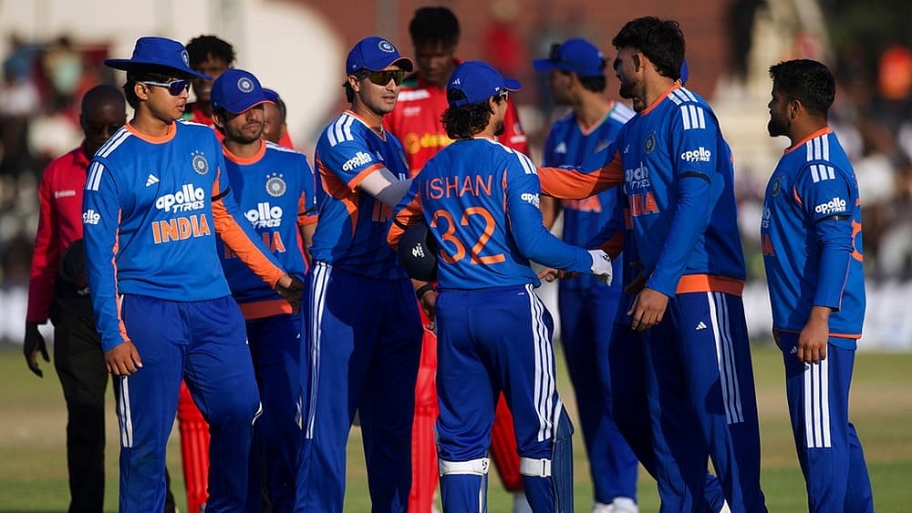 India's players celebrate following the second T20 cricket match between Zimbabwe and India in Harare, Zimbabwe. - | Photo: AP/Wonder Mashura