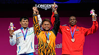 Rishikanta Chanambam Highlights, Commonwealth Games: Indian Weightlifter Bags Silver, Breaks CWG Snatch Record (AP Photo/Manish Swarup) : From left, Silver medalist India's Rishikant Chanambam Singh, Gold medalist Malaysia's Kasdan Bin Mohamad Aniq and Bronze medalist Kenya's Joshua Amunga Mboya celebrate after wining medals in 60 kilogram clean and jerk weightlifting during the Commonwealth Games in Glasgow, Scotland, Sunday, July 26, 2026.