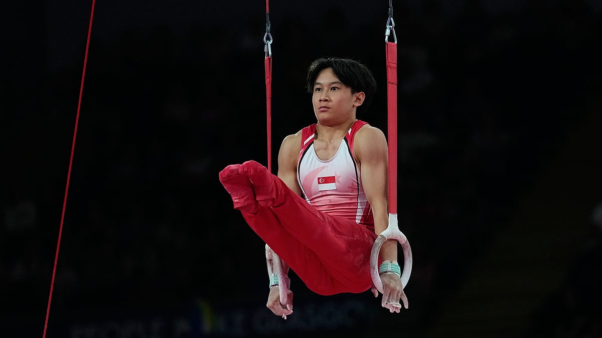 Singapore's Jovi Loh competes at the Rings during the men's team final and individual qualification of Artistic Gymnastics at the Commonwealth Games in Glasgow, Scotland, Friday, July 24, 2026. - (AP Photo/Manish Swarup)