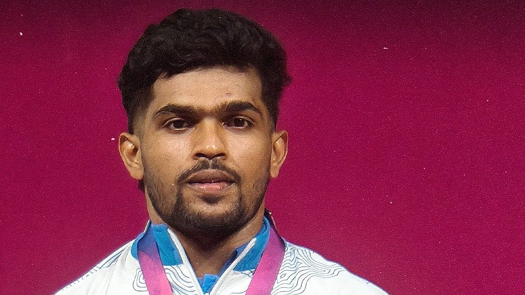 India's Raja Muthupandi captured a silver medal in the men's 65kg weightlifting event with a combined total of 286kg. - WeAreTeamIndia/X