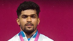 India's Raja Muthupandi captured a silver medal in the men's 65kg weightlifting event with a combined total of 286kg. - WeAreTeamIndia/X