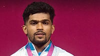 WeAreTeamIndia/X : India's Raja Muthupandi captured a silver medal in the men's 65kg weightlifting event with a combined total of 286kg.