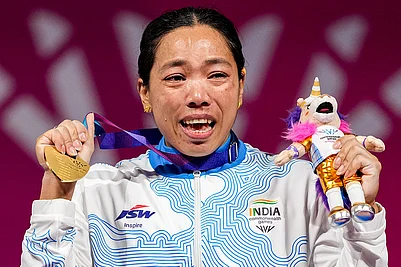| Photo: PTI/Ravi Choudhary : Indias Mirabai Chanu wins gold medal in the womens 48kg Final weightlifting competition at the 23rd Commonwealth Games, in Glasgow, Scotland, Sunday, July 26, 2026. She clinched her third successive Commonwealth Games gold medal in the women’s 48kg category.
