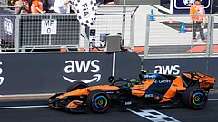 McLaren driver Lando Norris of Britain crosses the finish line to win the Formula One Hungarian Grand Prix auto race, at the Hungaroring racetrack in Mogyorod. - Darko Bandic/AP Photo
