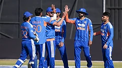 Indian cricketers celebrate a wicket against Zimbabwe in the third T20I at Harare. - BCCI/X