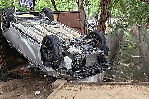 A damaged vehicle which was plunged into a water-filled drain near a traffic signal in Nangal Dewat area, a 20-year-old student pursuing higher education in the US and son of an Indian Army officer, died, at Vasant Kunj, in New Delhi. An eyewitness to the fatal road accident in southwest Delhi's Vasant Kunj has alleged that the absence of a protective safety wall at the accident spot makes the stretch hazardous.