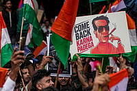Day In Pics: July 26, 2026 | Photo: PTI/Shashank Parade : People take part in a rally held by Shiv Sena (UBT) chief Uddhav Thackeray, unseen, and MNS chief Raj Thackeray, unseen, to celebrate the resignation of Union Education Minister Dharmendra Pradhan, in Mumbai. Pradhan resigned on Saturday, following which the Cockroach Janta Party called off its 36-day agitation that galvanised lakhs of people over irregularities in exams and the NEET paper leak.
